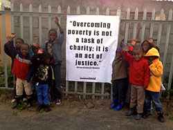 Irene Bucken '14, who spent the summer volunteering for a non-profit in Cape Town, took this photo of school children participating in a Nelson Mandela International Day service project. The day is celebrated on July 18, Nelson Mandela's birthday.