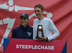Mike LeDuc '14, pictured here with Coach Jim Butler, wins his third NCAA national championship today with a posted time of 8:45.77 in the 3,000 meter steeplechase.