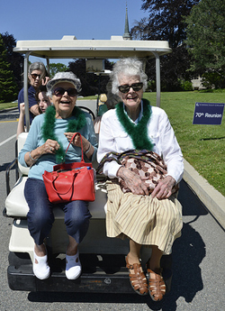 Alicia Speaker '43, left, and Barbara Brewster '43 catch a ride during Reunion 2013.