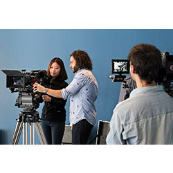 Sean Fine '96 (center) shows Bae Yung Kim '16 how to use an Arri Alexa camera while Juan Pablo Pacheco ’14 films the two with a RED Epic.