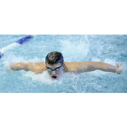 Sam Gill '14 swims to an All-American finish in the 100-yard butterfly at the 2013 NCAA Division III Swimming and Diving Championship.