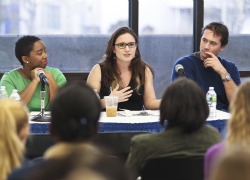 Lauren Burke '06 (center) talks about her experience with issues of global justice. She is joined on the panel by Tiana Davis Hercules ’04 (left) and James Rogers ’04.
