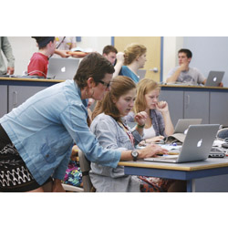 Career counselor Lori Balantic helps Lana Richards '17 log in to the College's career development web portal during a freshman orientation workshop designed to introduce students to the four-year career and professional development program.