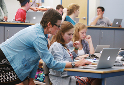 Career counselor Lori Balantic helps Lana Richards '17 log in to the College's career development web portal during a freshman orientation workshop designed to introduce students to the four-year career and professional development program.