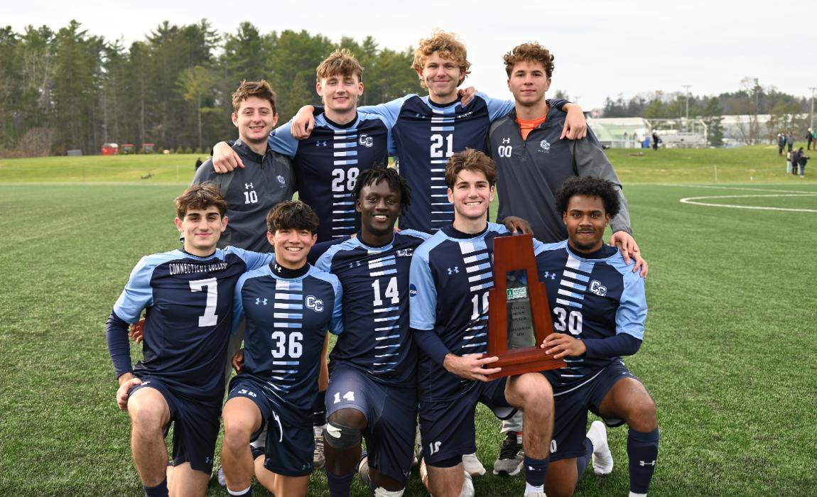 Sophomores of the Men's Soccer Team Pose with Trophy.