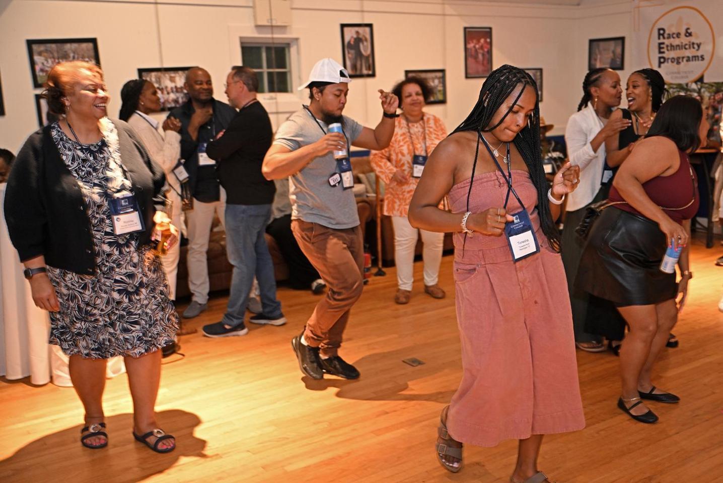 Alumni dancing in Unity House at Reunion 2024