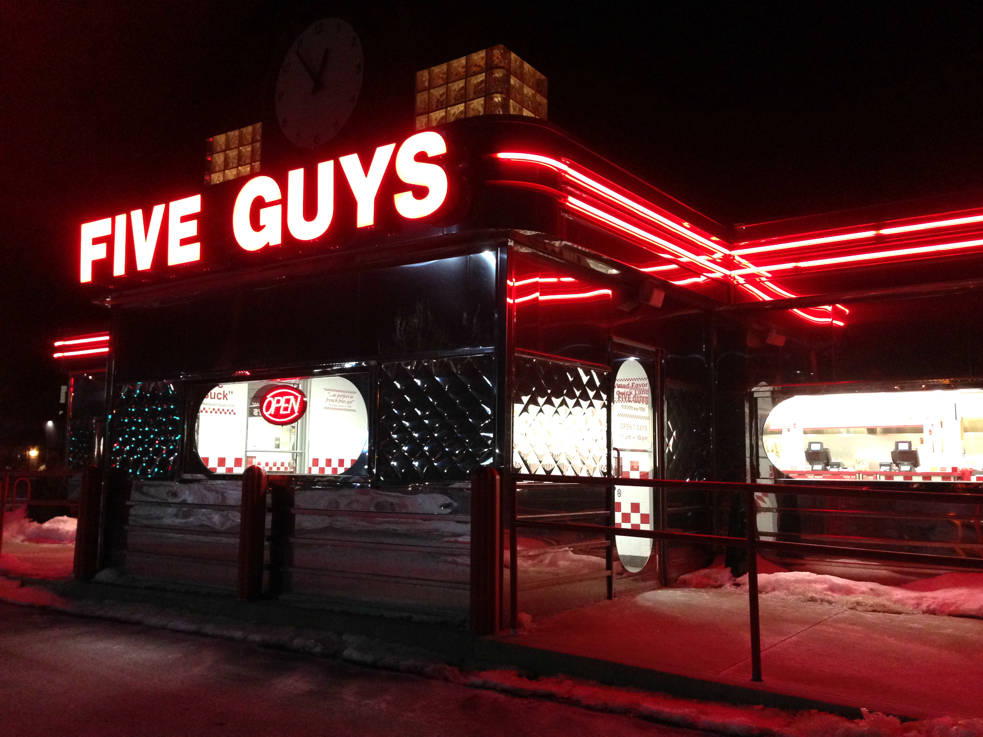 The outside of a Five Guys fast food restaurant