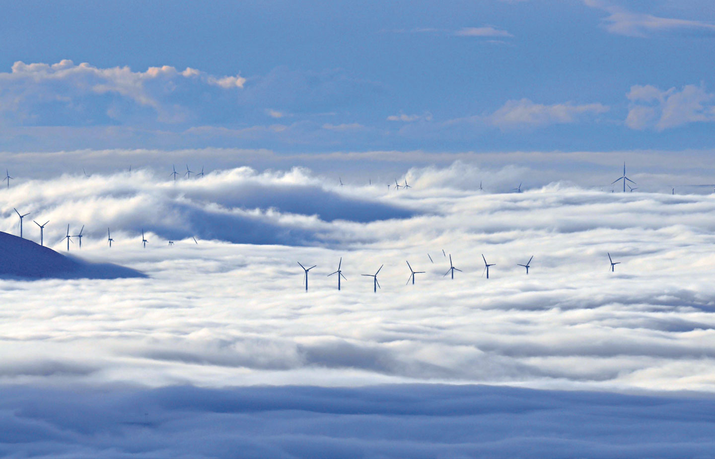 Image of windmills in the clouds