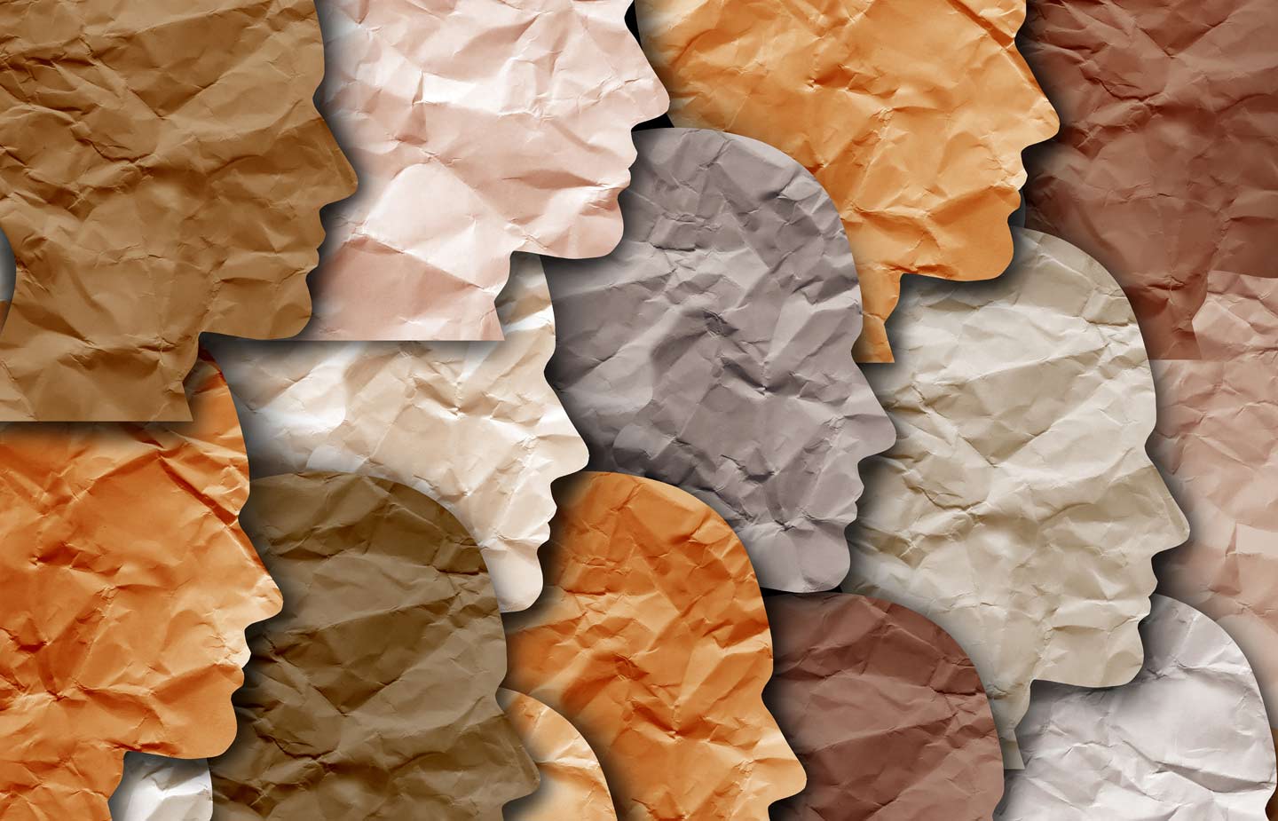 Abstract image of cut-paper heads of different colors