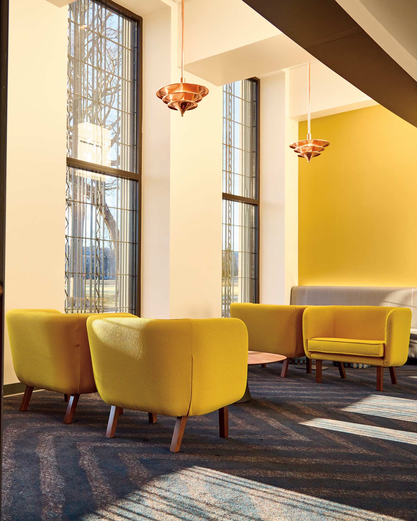 Image of chairs and windows in the Hovey Lobby at Athey Center