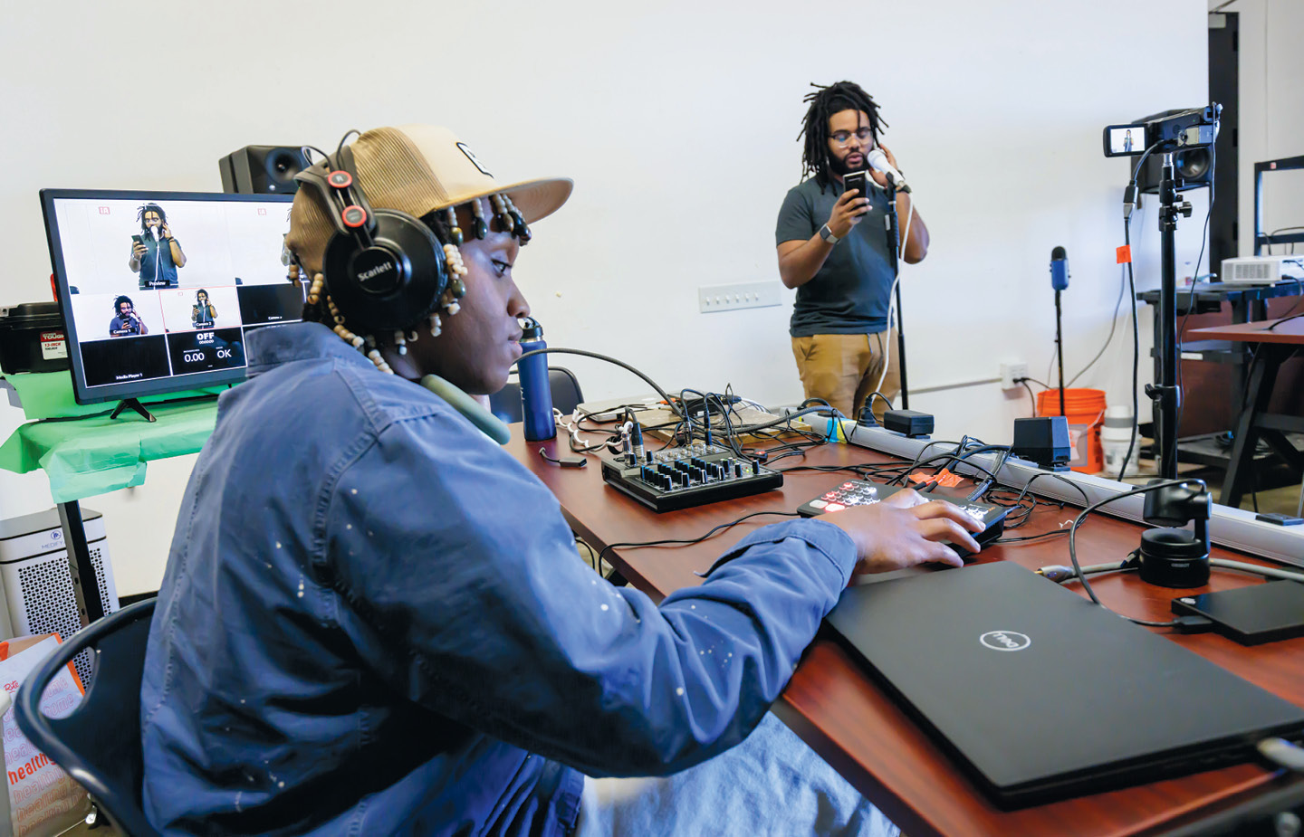 Ammerman Center scholar Leron Dugan ’24 (left) and Ammerman Community Research-Creation Fellow Josh Brown participate in The Art of Live Streaming Hybrid Events