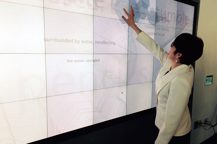 Katherine Bergeron using the Diane Y. Williams '59 Christie MicroTile Visualization Wall