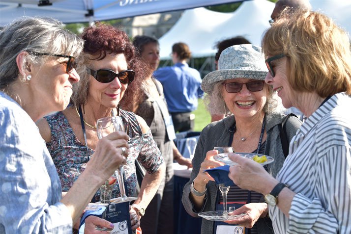 Members of the Class of '69 enjoy the President's Champagne Reception on Tempel Green on Friday