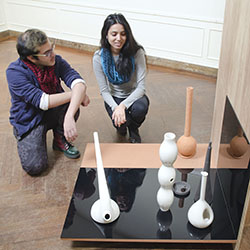 Anique Ashraf ’17 (left) and Prapti Kafle '16 examine work by Connecticut College Professor of Art Denise Pelletier on display in New London's Lyman Allyn Art Museum as part of “Transmissions: Teaching and Learning in the Studio,” an exhibit that runs through June 7.