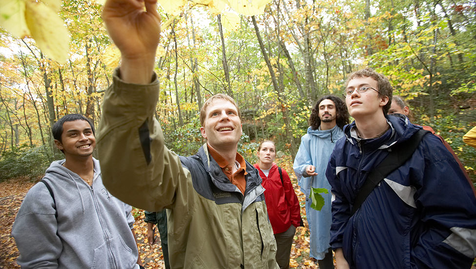 Botany professor Chad Jones with students doing fieldwork in the arboretum. 
