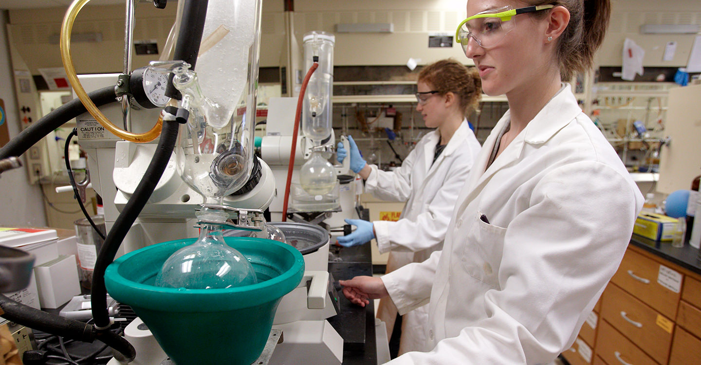 Two students working in a science lab