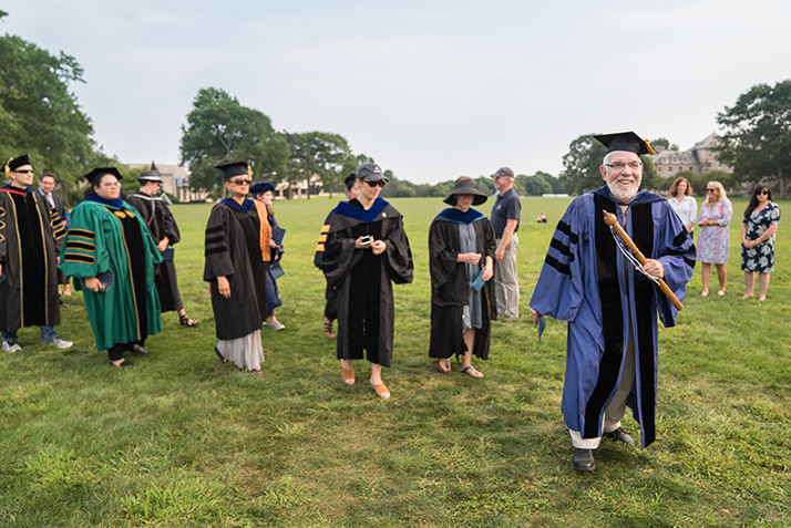 Faculty, led by Professor John Anthony, process into Convocation. 