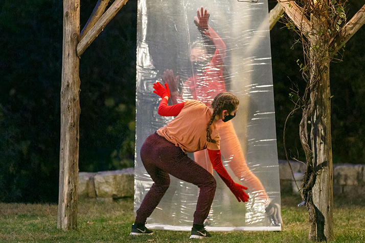 Dancers perform Reach, a work choreographed by Lisa Race, in the Arboretum.