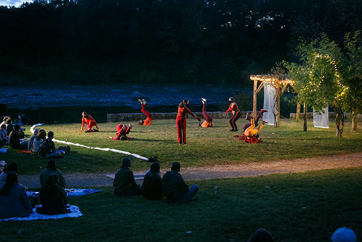 Dancers perform Reach, a work choreographed by Lisa Race, in the Arboretum.