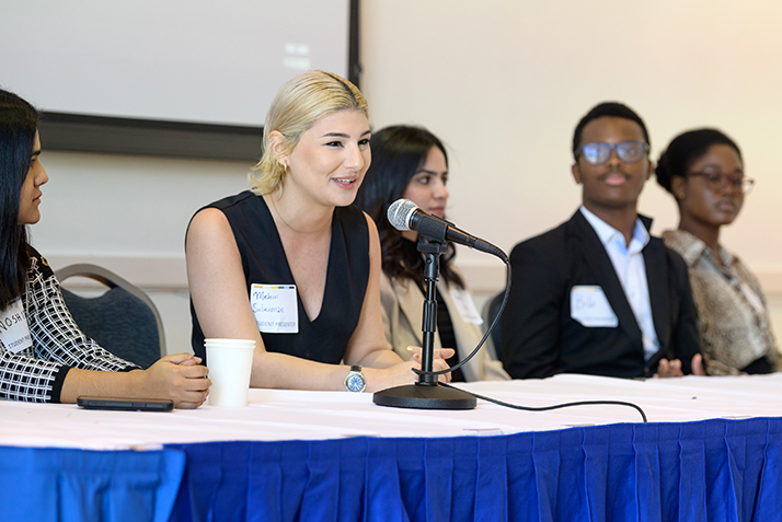 A student presents at a panel discussion during the ACS.