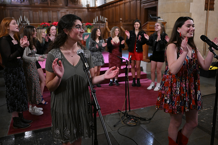 Students sing during an Advent event in the Chapel.