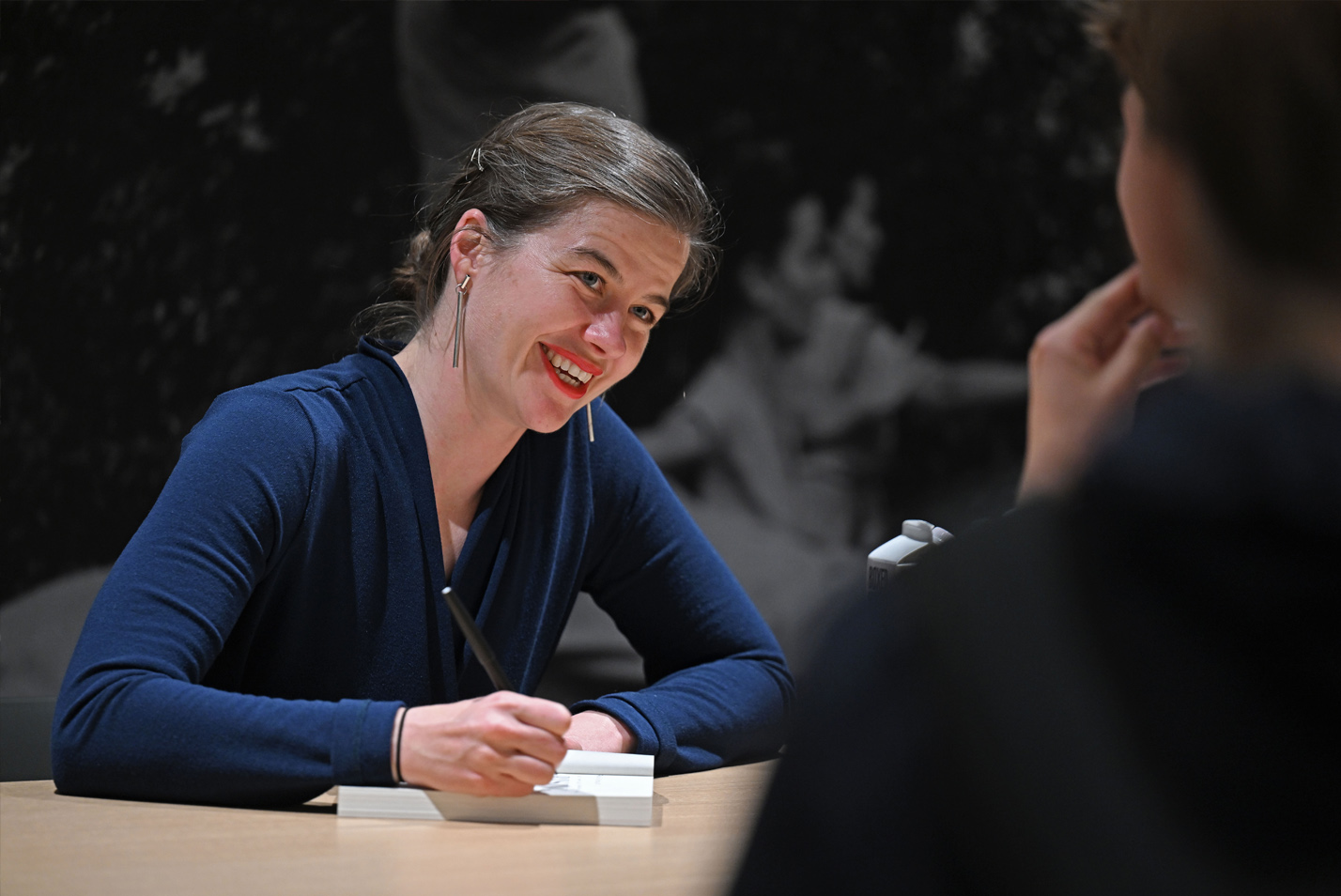 Acclaimed environmental writer Elizabeth Rush signs autographs following her lecture at the sixth annual President’s Distinguished Lecture Series April 10.