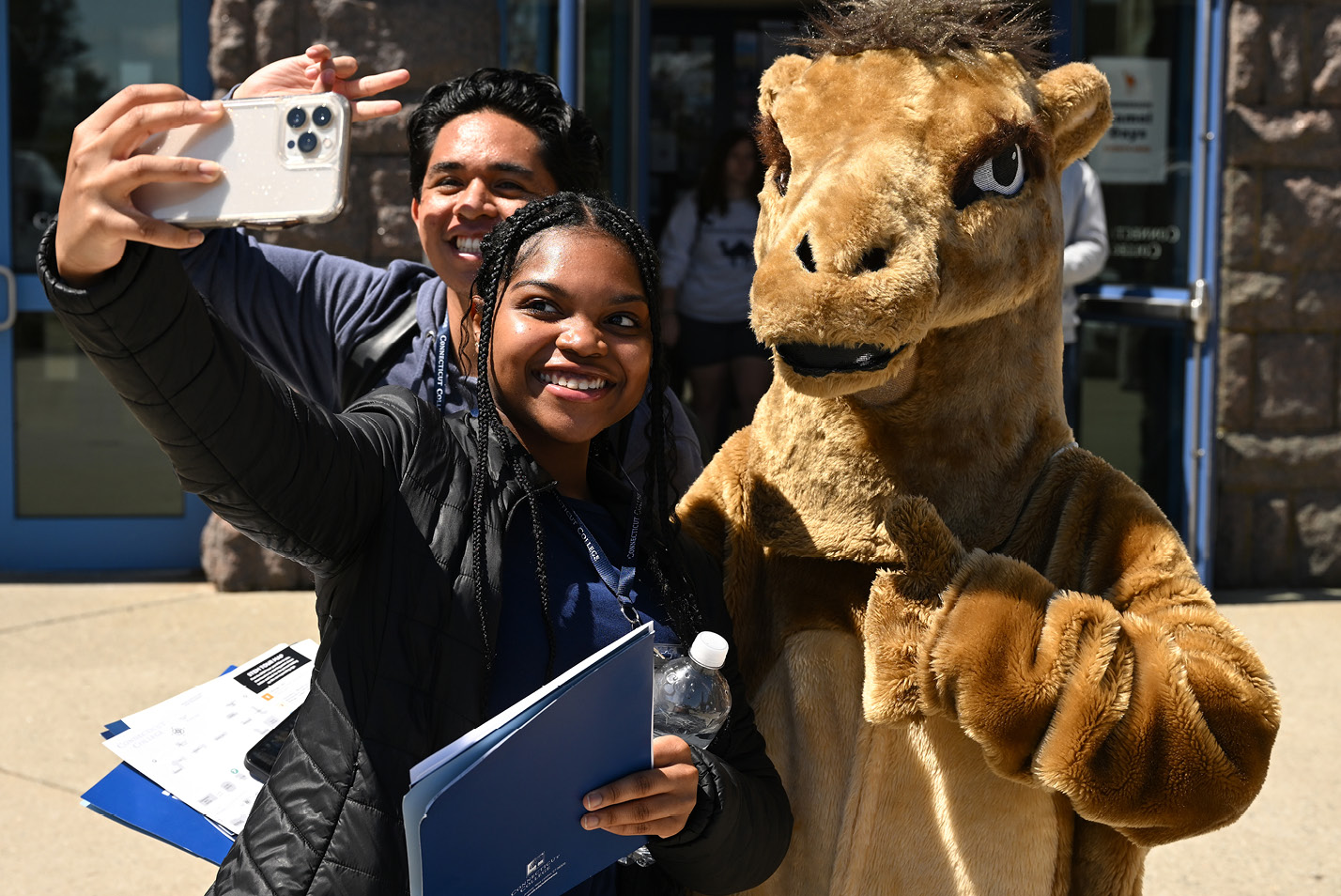 Accepted students take selfies with the mascot on Camel Days in April.