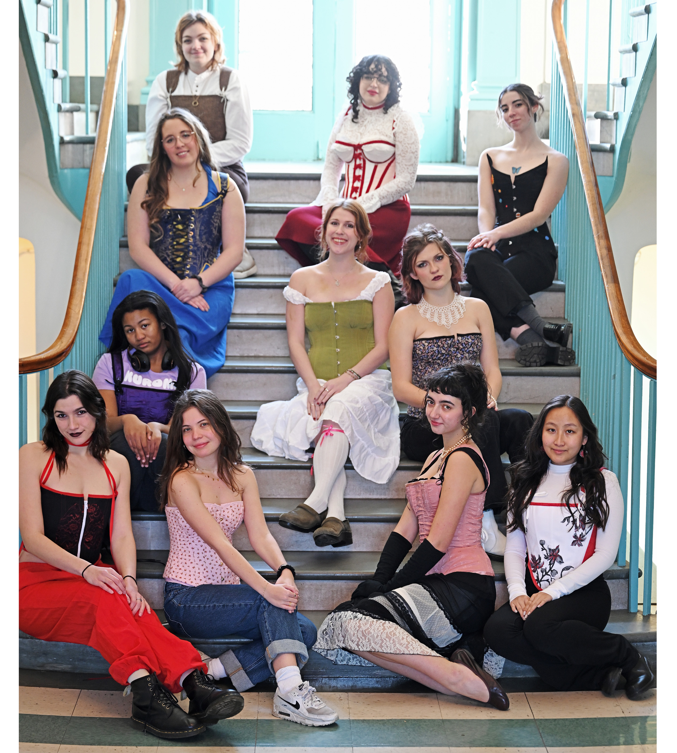 Students in professor Sabrina Notarfrancisco’s THE 362 Corsets and Crinolines class model their final creations for the semester Friday, December 15, 2023 on the Knowlton Hall grand staircase.