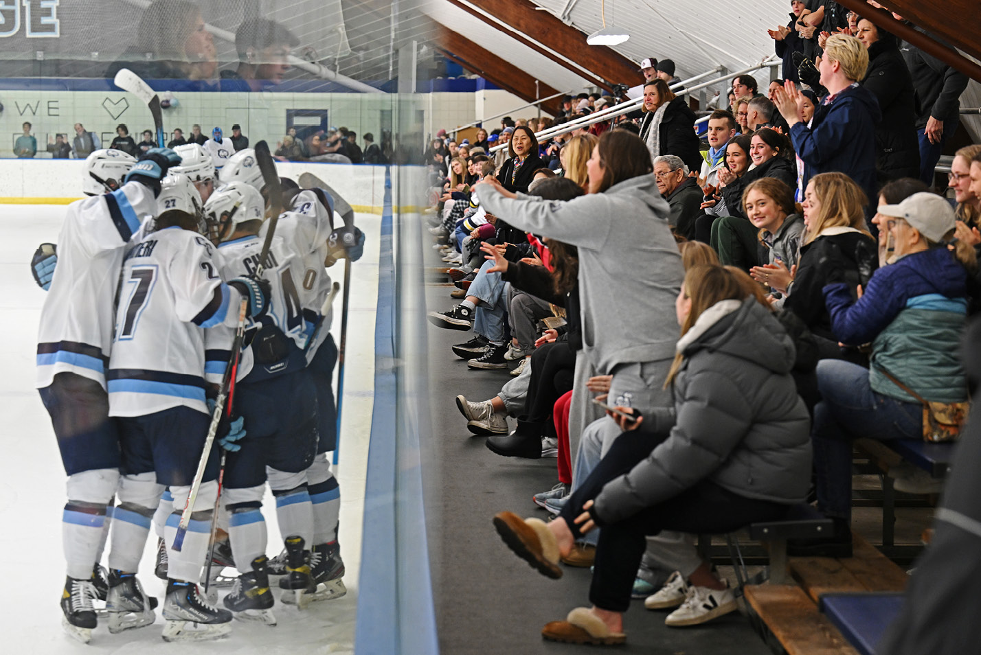 Fans cheer on the men's hockey team at Dayton Arena in February.