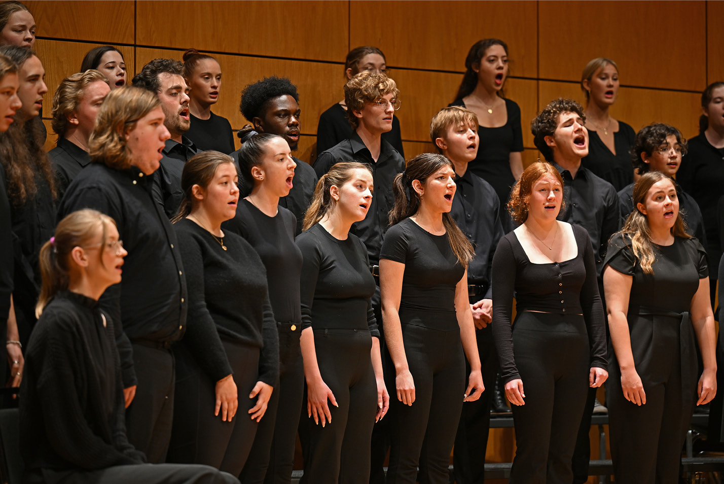 The choir performs in Evans Hall at Fall Weekend 2023.