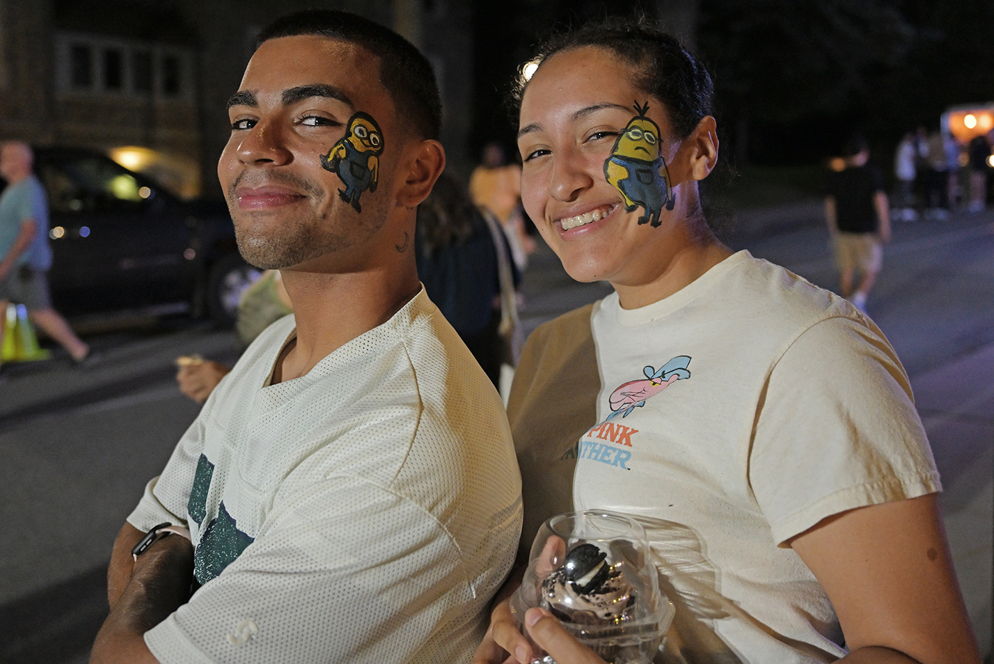 two students sport matching Minions facepaint.