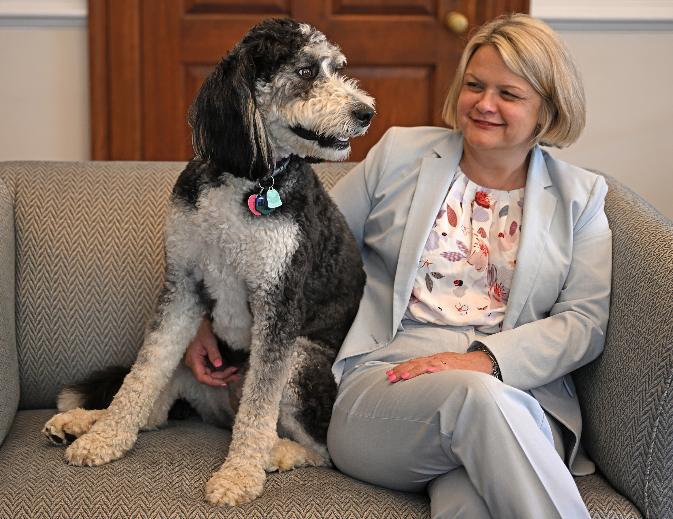 President Andrea Chapdelaine and her dog Koda.