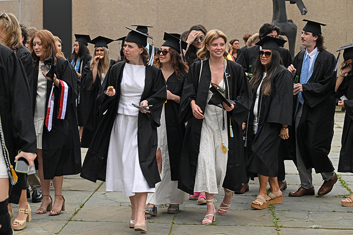 Graduating seniors make their way to commencement exercises.