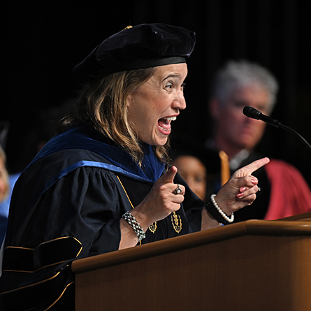 Associate Professor of Economics Mónika López Anuarbe gives the keynote address at Convocation.