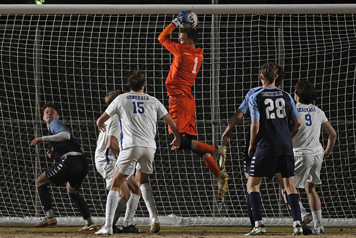 Goalie Peter Silvester '25 makes a save in the NCAA semifinal matchup.