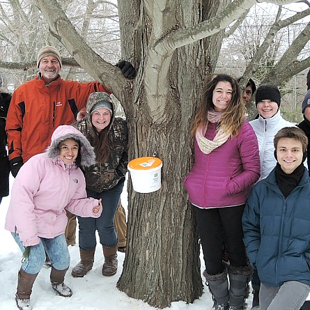 Grounds supervisor Jim Luce holds a maple syrup-making workshop.