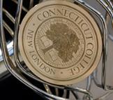 The Connecticut College seal on the mace