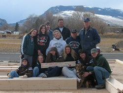 This year's largest alternative spring break trip gives students the opportunity to travel to other states to help build homes for low-income families through Habitat for Humanity. Above, participants pose at the site of a Habitat home in Cody, Wyo.