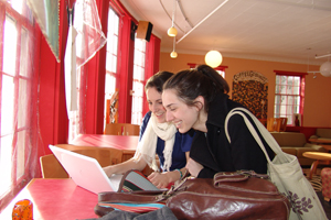 Alexandra Foley '12 (left) and Rebecca Lieberman '12 enjoy some downtime at Coffee Grounds.