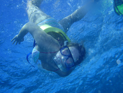 Rita Holak '10 snorkels on the Great Barrier Reef of the coast of Cairns.