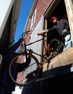 Donated bicycles are unloaded at Connecticut College.